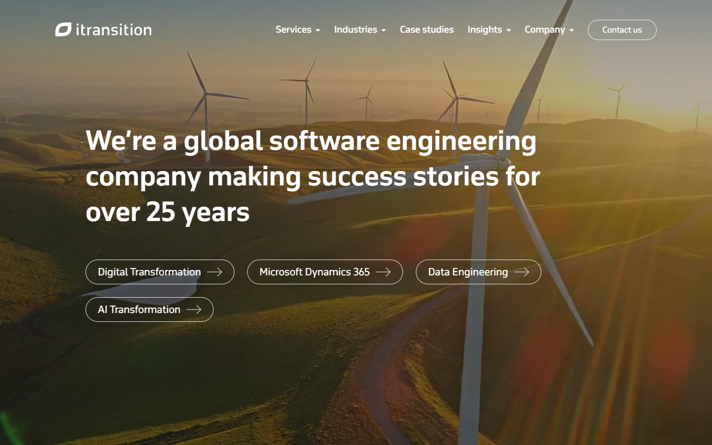 Itransition homepage headline over wind turbines, with digital transformation, Dynamics 365, data, and AI service buttons.