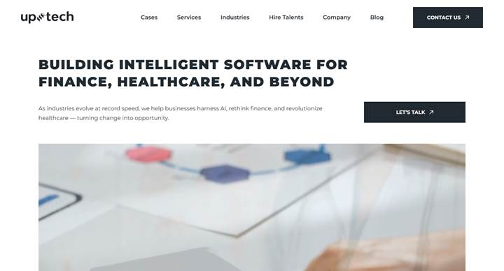 Uptech homepage with a Building intelligent software for finance, healthcare, and beyond headline and a contact button.